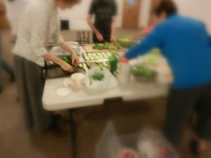 Kristina trying to make lunch for everyone down in the basement.