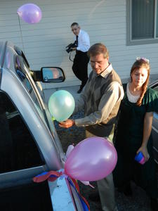 Hiding the door handles with balloons.