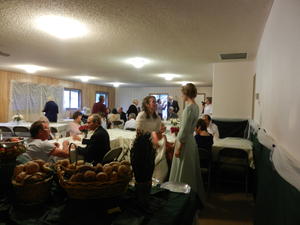 Kristina going inside to inform them it was time for them to leave.