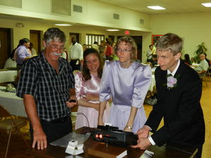 Trying to get the ancient slide protector working at the reception.
