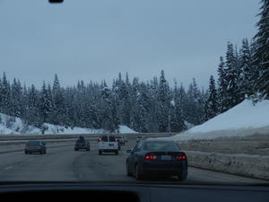 The snow was very thick and the banks were high on the side of the road.