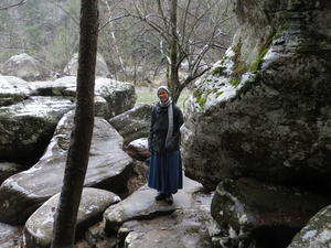 Kristina getting ready to climb behind the falls.