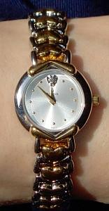 The watchband filled with hearts is a fitting
symbol of our love and joy in our engagement.