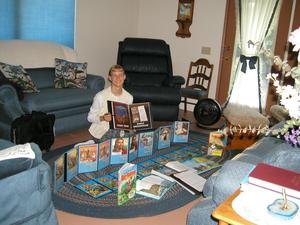 By now a seasoned colporteur, Kristina shows her book display as she had all summer while big booking (colporteuring) in Michigan.