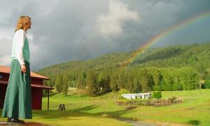 To a nature enthusiast like Kristina, Washington state provided its own wonderland of mountains, meadows, and gourgeous rainbows. It turns out that this one was best viewed from the top of Kristina's Toyota Tercel.
